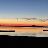 Schildmeer ondergaande zon